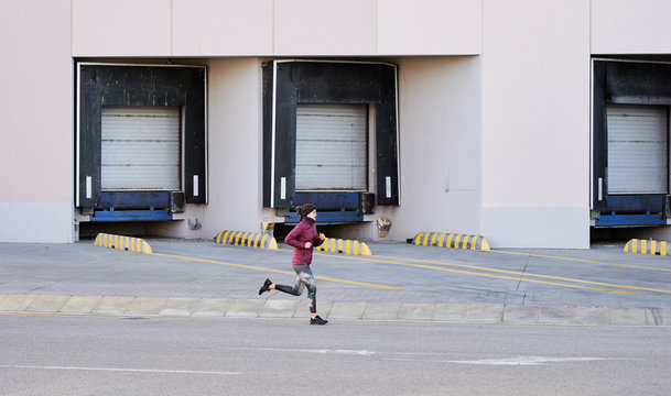 Runner industrial zone winter.