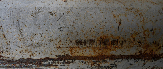 Horizontal texture of a metal plate with corrosion and scratches