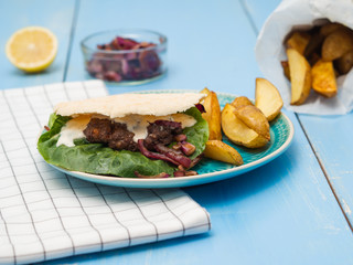 beef burgers with potato wedges