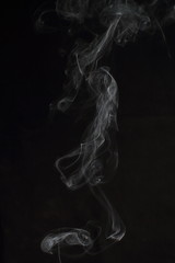 Abstract white smoke texture on black background