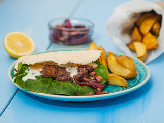 beef burgers with potato wedges
