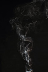 Abstract white smoke texture on black background