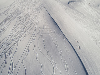 People skiing on the mountain aerial view
