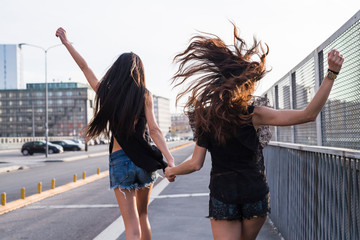 Two friends having fun in the city