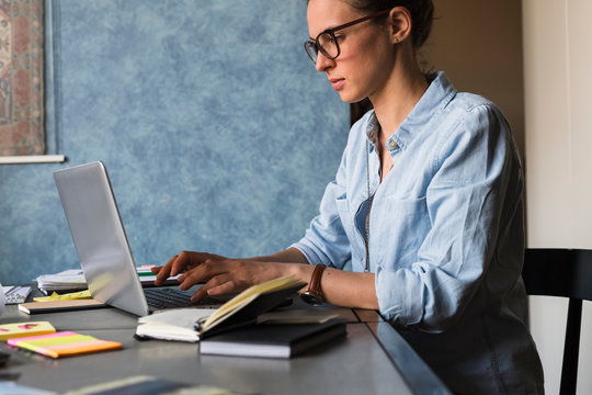 Young businesswoman working in home office