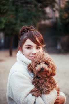 Portrait of a woman with a adorable dog