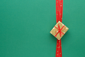 Christmas composition. Gift ribbon top view background with copy space for your text. Flat lay.