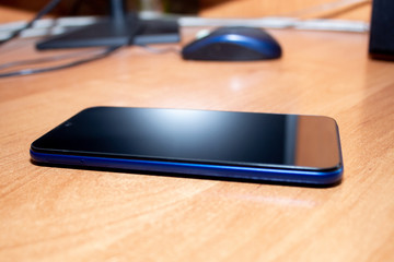 smartphone lies on the desktop
