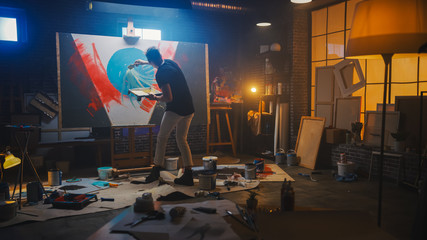 Talented Artist Working on Abstract Painting, Uses Tray Palette to Mix Colors and Paint Brush To...