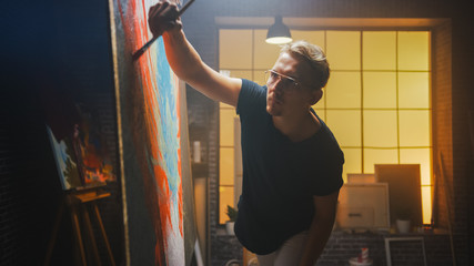 Talented Artist Working on Abstract Painting, Uses Paint Brush To Create Daringly Emotional Modern...
