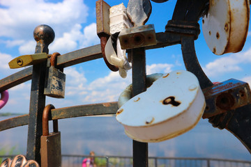 The lock of love, colorful padlocks on bridge fence