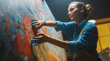 Talented Innovative Female Artist Draws with Her Hands on the Large Canvas, Using Fingers She...