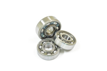 Ball bearing on a white background, Motorcycle bearing close-up.