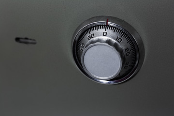 Close-up of mechanical code lock, of metal safe.