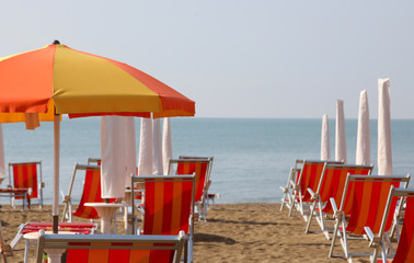 sunshade and deckchairs on the beach