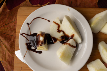 Apple with chocolate sauce