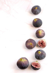 Top view of Ripe sweet figs (ficus carica) on a stone table