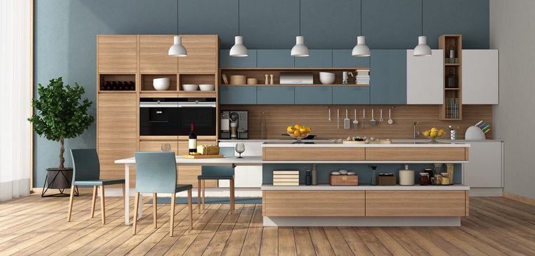 Modern kitchen with island and dining table