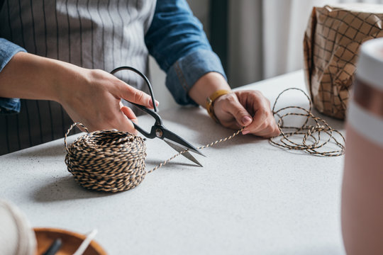 Artisan Packing a Product