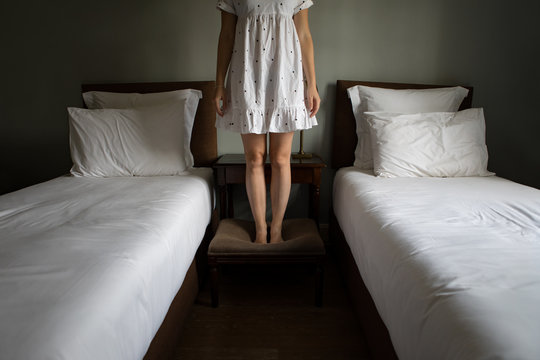 Woman at Spooky Bedroom