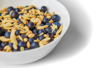 Breakfast: oatmeal with blueberries, pine nuts and almonds.