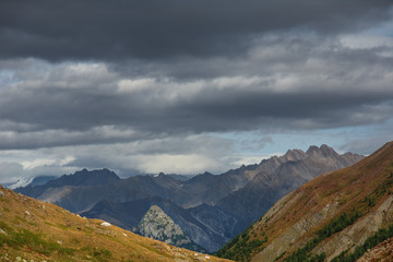 Beautiful scenery from the Italian Alps with picturesque rivers and waterfalls, cliffs and magical mountain valleys