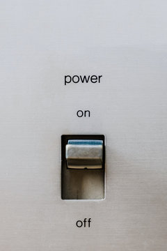 Close up of Vintage Amplifier power button