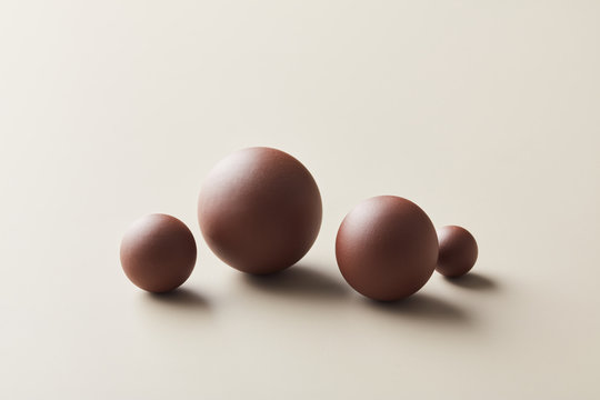 Collection of brown spheres in different sizes