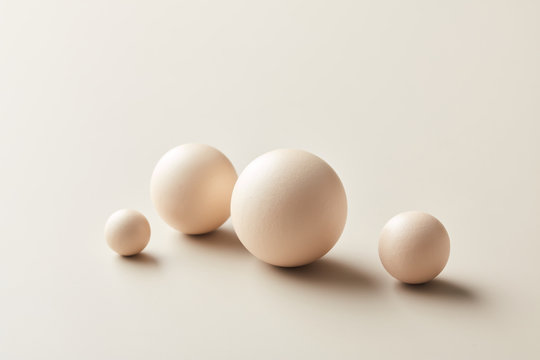 Set of white balls in different sizes