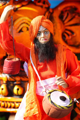 Indian Priest Sadhu Devotee Saint in Beards Playing Music Statue Cultural Traditional