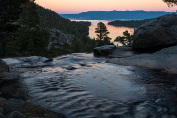 View to the Tahoe Lake from Eagle Fall. Calm evening and colorful sunset.