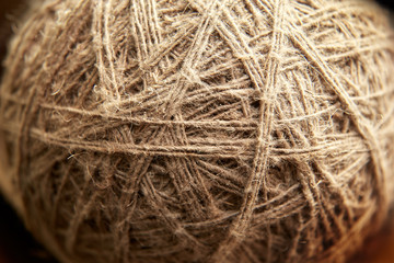 Ball of grey natural linen string top view.