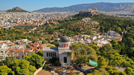 Aerial drone photo of Athens National Observatory and Acropolis - Lycabettus hill at the background, Attica, Greece