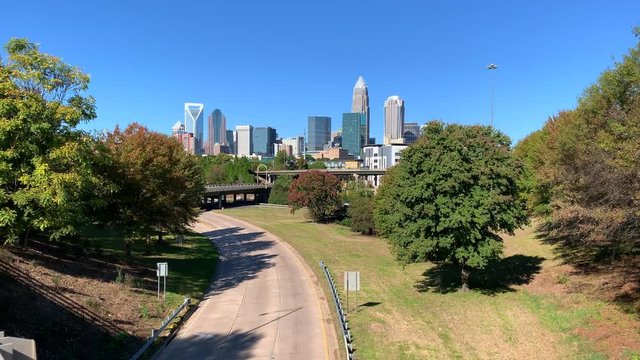 Charlotte, North Carolina city skyline in early autumn with blue skies 