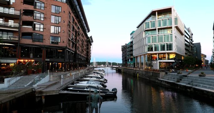 Oslo, Norway. Panorama, Panoramic View Of Residential Multi-storey Houses In Aker Brygge District In Summer Evening. Famous And Popular Place. 4K