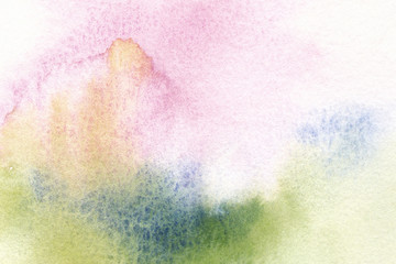 watercolor wash in pink, green, and blue