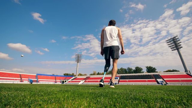 Practice session of a handicapped footballer, soccer player