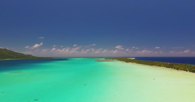 Still Aerial Shot of the Pacific Turquoise Water and the Islands of Bora Bora