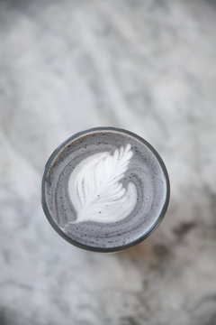 Overhead view of toasted black sesame latte