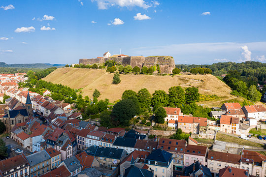 Bitche historical town center and star shaped bastions and outworks of hilltop Citadelle de Bitche, medieval fortress and stronghold near German border in Moselle department, Grand Est, France