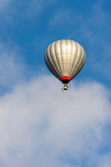 Whire hot air balloon in tourist flight