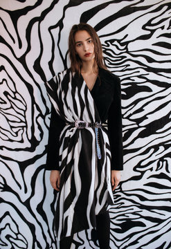 Woman wearing clothes with zebra print
