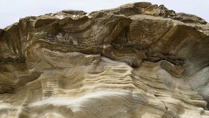 Rocks and limestone eroded on the coast of the sea