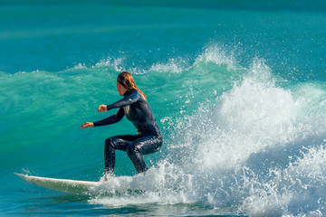 Surfer surfing on waves