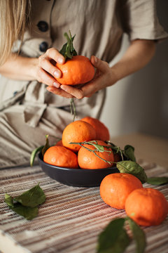 details of fresh mandarins on the table