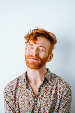 portraits of young redhead cool man