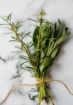 Fresh rosemary and sage ready to flavour a stew.