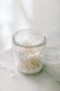 Cotton swabs in vintage jar