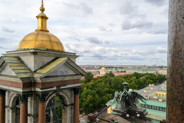 Rooftop view of the city of Saint Petersburg in Russia seen from the top of St. Isaac cathedral, chaotic urbanscape with some emerging monuments