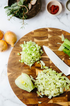 Preparation of a sofrito for a slow cooked dish.